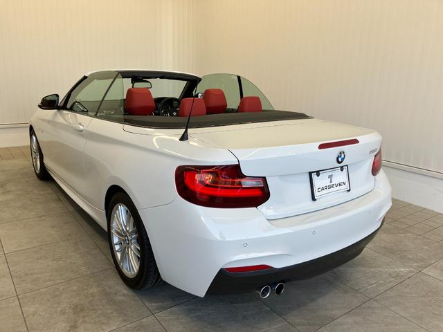 ２シリーズ ２２０ｉカブリオレ　Ｍスポーツ　１オーナー車両　アルピンホワイトＩＩＩ×赤シート　運転／助手席シートヒーター　障害物センサー　ＥＴＣ　純正ナビゲーション　バックカメラ　Ｂｌｕｅｔｏｏｔｈ　パドルシフト　純正１７インチアルミホイール（8枚目）