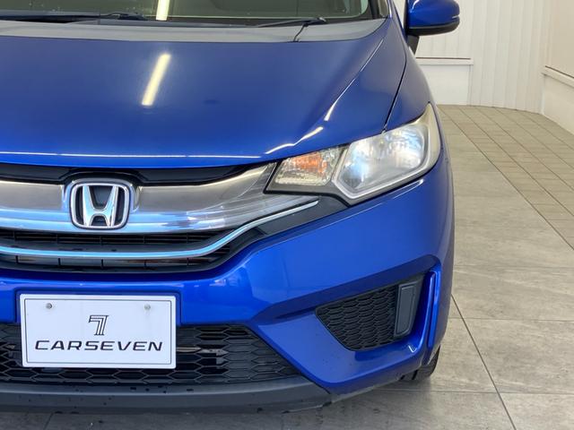 フィットハイブリッド Ｆパッケージ　修復歴無し　車検整備付　１２ヶ月保証付き　純正ナビ　バックカメラ　Ｂｌｕｅｔｏｏｔｈ　ＥＴＣ　ＣＤ／ＤＶＤ　スマートキー　プッシュスターター　スペアキー　電動格納ミラー　社外１５インチアルミホイール（3枚目）