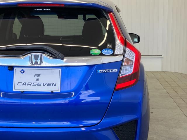 フィットハイブリッド Ｆパッケージ　修復歴無し　車検整備付　１２ヶ月保証付き　純正ナビ　バックカメラ　Ｂｌｕｅｔｏｏｔｈ　ＥＴＣ　ＣＤ／ＤＶＤ　スマートキー　プッシュスターター　スペアキー　電動格納ミラー　社外１５インチアルミホイール（4枚目）