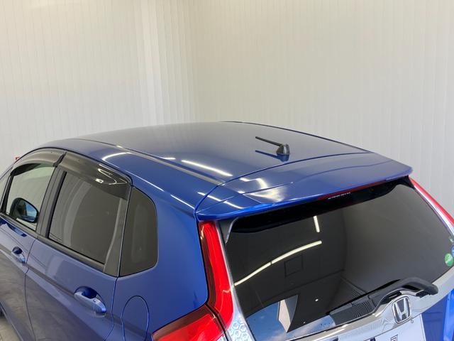 フィットハイブリッド Ｆパッケージ　修復歴無し　車検整備付　１２ヶ月保証付き　純正ナビ　バックカメラ　Ｂｌｕｅｔｏｏｔｈ　ＥＴＣ　ＣＤ／ＤＶＤ　スマートキー　プッシュスターター　スペアキー　電動格納ミラー　社外１５インチアルミホイール（7枚目）