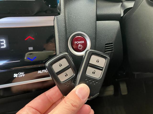 フィットハイブリッド Ｆパッケージ　修復歴無し　車検整備付　１２ヶ月保証付き　純正ナビ　バックカメラ　Ｂｌｕｅｔｏｏｔｈ　ＥＴＣ　ＣＤ／ＤＶＤ　スマートキー　プッシュスターター　スペアキー　電動格納ミラー　社外１５インチアルミホイール（12枚目）