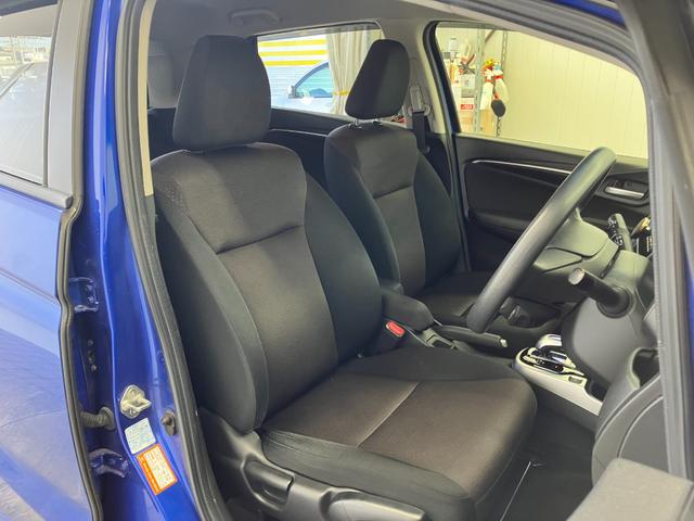 フィットハイブリッド Ｆパッケージ　修復歴無し　車検整備付　１２ヶ月保証付き　純正ナビ　バックカメラ　Ｂｌｕｅｔｏｏｔｈ　ＥＴＣ　ＣＤ／ＤＶＤ　スマートキー　プッシュスターター　スペアキー　電動格納ミラー　社外１５インチアルミホイール（34枚目）