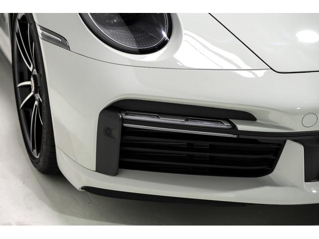 911 911ターボS カブリオレ スポーツエグゾーストシステム LEDマトリックスヘッドライトブラック ヒーター付きGTスポーツステアリングホイール レーンチェンジアシスト ポルシェロゴブラックペイント仕上げ ストレージパッケージ(22枚目)