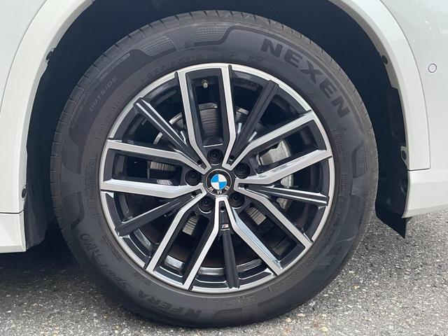 X1 xDrive 20i Mスポーツ 認定中古車 4WD カーブドディスプレイ ハーフレザーシート アップルカープレイ アダプティブクルーズコントロール サラウンドビューモニター ワイヤレスチャージング シートヒーター アダプティブLED(55枚目)
