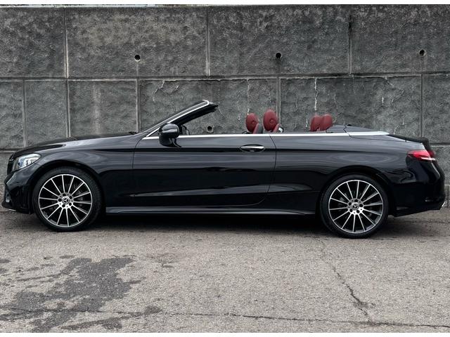Cクラス C180カブリオレスポーツ レザーエクスクルーシブパッケージ/ワンオーナー/後期型/赤革シート/赤幌/電動オープン/レーダーセーフティ/ACC/アンビエントライト/シートヒーター/HUD/LEDヘッド/純正19インチAW(9枚目)