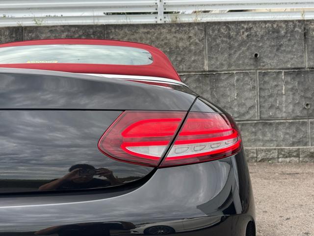 Cクラス C180カブリオレスポーツ レザーエクスクルーシブパッケージ/ワンオーナー/後期型/赤革シート/赤幌/電動オープン/レーダーセーフティ/ACC/アンビエントライト/シートヒーター/HUD/LEDヘッド/純正19インチAW(28枚目)