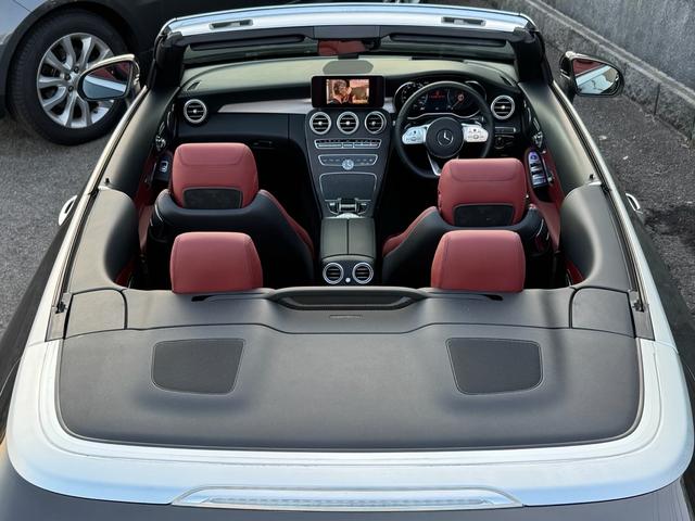 Cクラス C180カブリオレスポーツ レザーエクスクルーシブパッケージ/ワンオーナー/後期型/赤革シート/赤幌/電動オープン/レーダーセーフティ/ACC/アンビエントライト/シートヒーター/HUD/LEDヘッド/純正19インチAW(75枚目)