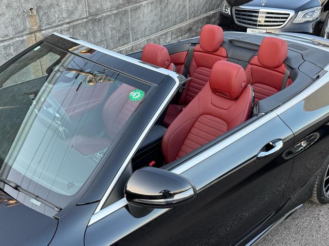 Cクラス C180カブリオレスポーツ レザーエクスクルーシブパッケージ/ワンオーナー/後期型/赤革シート/赤幌/電動オープン/レーダーセーフティ/ACC/アンビエントライト/シートヒーター/HUD/LEDヘッド/純正19インチAW(76枚目)