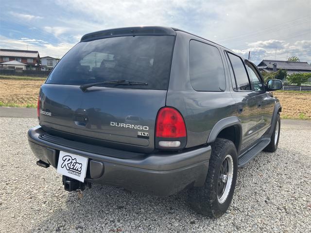 ダッジ・デュランゴ SLTプラス 新車並行 1No登録/ユーザー買取/6人乗車登録/ベージュレザーシート/シートヒーター/フロントベンチシート 社外17インチアルミホイール ヒッチメンバー クルーズコントロール(9枚目)