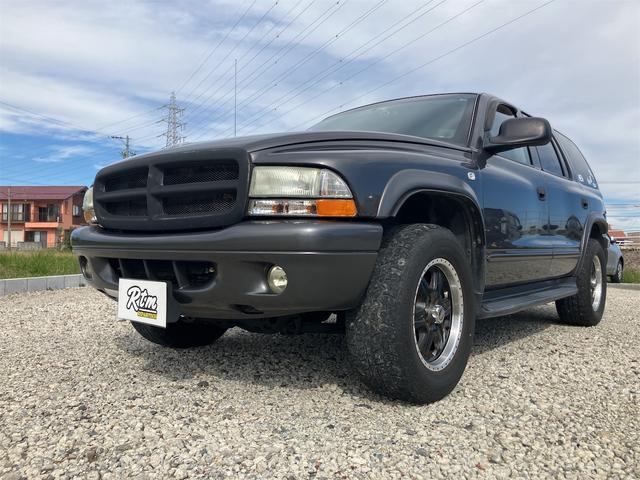 ダッジ・デュランゴ SLTプラス 新車並行 1No登録/ユーザー買取/6人乗車登録/ベージュレザーシート/シートヒーター/フロントベンチシート 社外17インチアルミホイール ヒッチメンバー クルーズコントロール(32枚目)