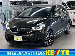 フィット e:HEVリュクス ホンダセンシング 純正9インチナビ ワイヤレス充電 本革シート シートヒーター バックカメラ BTオーディオ フルセグTV CD・DVD ETC パーキングセンサー オートブレーキホールド LEDライト 純正16AW 中古車画像