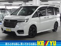ステップワゴンスパーダ e:HEVスパーダG・EXホンダセンシング ブラックスタイル マルチビューカメラ パークアシスト 後退出庫サポート 後席モニター 純正10型ナビ シートヒーター ホンダセンシング ETC2.0 わくわくゲート 両側パワースライド パーキングセンサー LEDランプ 中古車画像