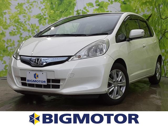 ホンダ フィットハイブリッドハイブリッド ナビプレミアムセレクション 純正インターナビ パーキングアシスト バックガイド ヘッドランプ ｈｉｄ ｅｔｃ ｅｂｄ付ａｂｓ 横滑り防止装置 アイドリングストップ バックモニター 地上波デジタルチューナー ｄｖｄ