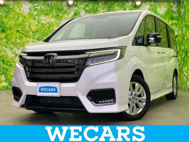 ステップワゴンスパーダ(ホンダ) スパーダクールスピリット・ＨＳブラックスタイル　保証書／社外　１０インチ　ＳＤナビ／フリップダウンモニター　社外　１０．２インチ／ホンダセンシング／両側電動スライドドア／シートヒーター／車線逸脱防止支援システム／シート　ハーフレザー 中古車画像