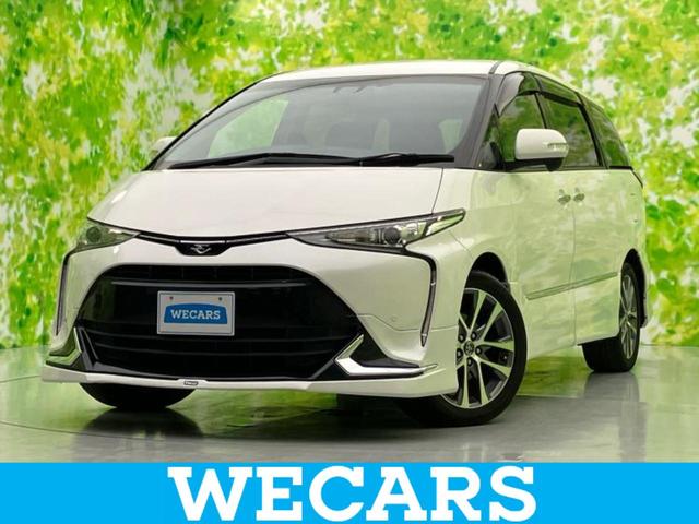沖縄県の中古車ならエスティマ アエラスプレミアム　新品タイヤ／純正エアロ／純正　１０インチ　ＳＤナビ／フリップダウンモニター　純正　１２．８インチ／衝突安全装置／両側電動スライドドア／車線逸脱防止支援システム／シート　ハーフレザー　フルエアロ　禁煙車