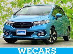 フィットハイブリッド ハイブリッド・F 新品タイヤ/保証書/純正 SDナビ/衝突安全装置/車線逸脱防止支援システム/パーキングアシスト バックガイド/ヘッドランプ LED/USBジャック/Bluetooth接続/ETC 衝突被害軽減システム 中古車画像