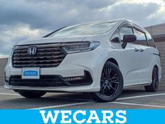 オデッセイハイブリッド eHEVアブソルート・EXブラックエディション 保証書/純正 11インチ SDナビ/フリップダウンモニター 純正 12.8インチ/ホンダセンシング/両側電動スライドドア/シートヒーター/マルチビューカメラシステム/車線逸脱防止支援システム 革シート 中古車画像