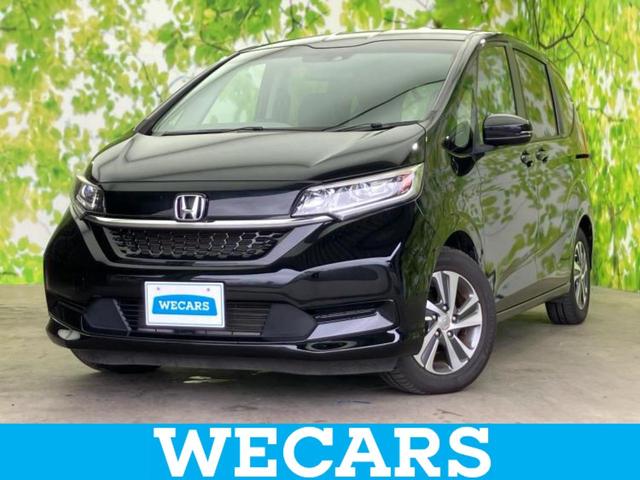 フリード Ｇホンダセンシング　保証書／社外　ＳＤナビ／フリップダウンモニター　社外　１１．５インチ／ホンダセンシング／両側電動スライドドア／シートヒーター　前席／車線逸脱防止支援システム／シート　ハーフレザー　衝突被害軽減システム（1枚目）