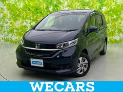 フリードハイブリッド 4WDハイブリッドGホンダセンシング 新品タイヤ/保証書/純正 SDナビ/衝突安全装置/両側電動スライドドア/シートヒーター/車線逸脱防止支援システム/ヘッドランプ LED/Bluetooth接続/ETC/EBD付ABS バックカメラ 中古車画像