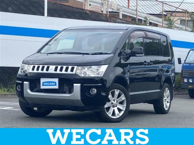 デリカD:5(三菱) 4WD Dパワーパッケージ 保証書/社外 9インチ SDナビ/フリップダウンモニター 社外 10.1インチ/シートヒーター/ヘッドランプ HID/Bluetooth接続/ETC/EBD付ABS/横滑り防止装置 バックカメラ 中古車画像
