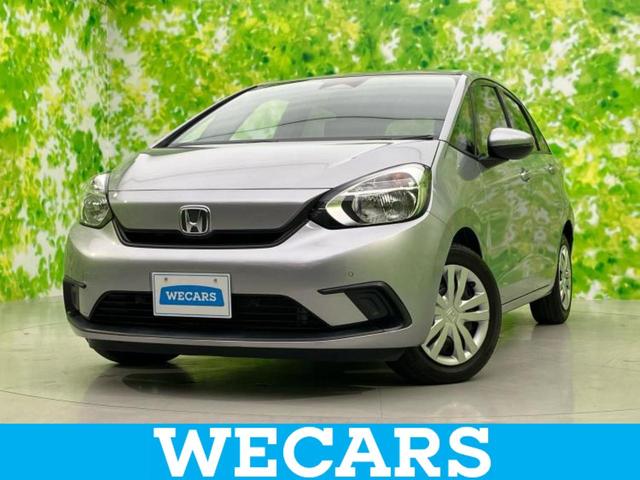 フィット(ホンダ) ベーシック 新品タイヤ/保証書/社外 ナビ/ホンダセンシング/車線逸脱防止支援システム/Bluetooth接続/ETC/EBD付ABS/横滑り防止装置/アイドリングストップ/クルーズコントロール/バックモニター 中古車画像