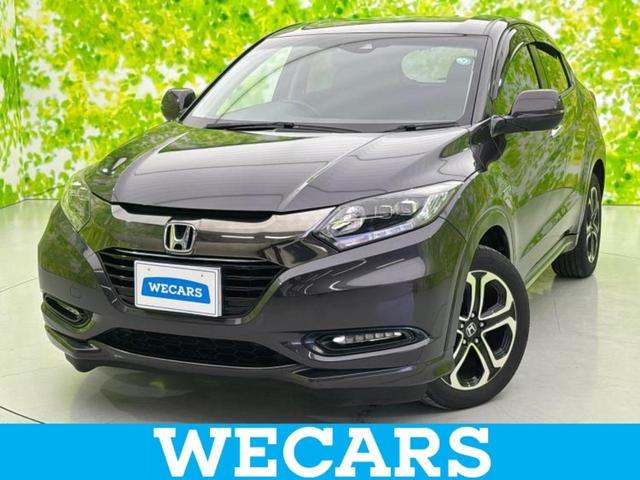 ヴェゼル(ホンダ) 4WDハイブリッドZ・ホンダセンシング 新品タイヤ/保証書/Aftermarket SDナビ/シートヒーター/シート ハーフレザー/ヘッドランプ LED/ETC/EBD付ABS/横滑り防止装置/アイドリングストップ/フルセグTV/エアバッグ 運転席 4WD 中古車画像