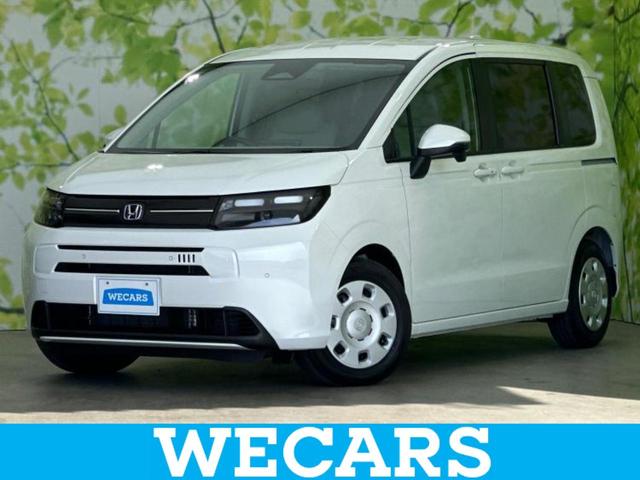 フリード(ホンダ) eHEVエアー 保証書/純正 8インチ ナビ/ホンダセンシング/両側電動スライドドア/車線逸脱防止支援システム/パーキングアシスト バックガイド/登録済未使用車/ヘッドランプ LED/USBジャック バックカメラ 中古車画像