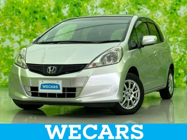 フィット(ホンダ) 13G・スマートセレクションファインスタイル 新品タイヤ/社外 メモリーナビ/パーキングアシスト バックガイド/Bluetooth接続/ETC/バックモニター/フルセグTV/エアバッグ 運転席/エアバッグ 助手席/パワーウインドウ バックカメラ 中古車画像