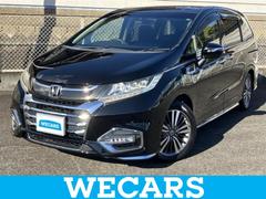 オデッセイハイブリッド ハイブリッドアブソルート・ホンダセンシング 新品タイヤ/保証書/純正 9インチ SDナビ/フリップダウンモニター 純正 11インチ/ホンダセンシング/両側電動スライドドア/車線逸脱防止支援システム/シート ハーフレザー 衝突被害軽減システム 中古車画像