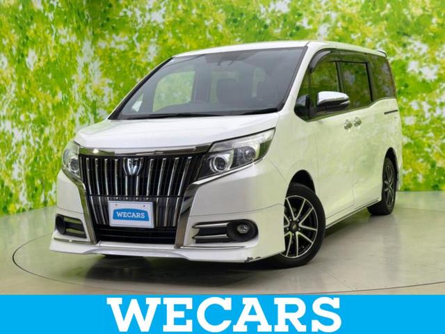 エスクァイア(トヨタ) Ｇｉブラックテーラード　エアロ／純正　１０インチ　ＳＤナビ／フリップダウンモニター／衝突安全装置／両側電動スライドドア／シートヒーター／車線逸脱防止支援システム／シート　合皮／ヘッドランプ　ＬＥＤ／ＥＴＣ／ＥＢＤ付ＡＢＳ 中古車画像