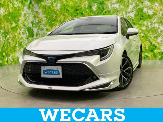 カローラスポーツ(トヨタ) ハイブリッドＧ　Ｚ　純正エアロ／保証書／ディスプレイオーディオ／衝突安全装置／シートヒーター／車線逸脱防止支援システム／シート　合皮／ヘッドランプ　ＬＥＤ／ＵＳＢジャック／Ｂｌｕｅｔｏｏｔｈ接続／ＥＢＤ付ＡＢＳ　記録簿 中古車画像