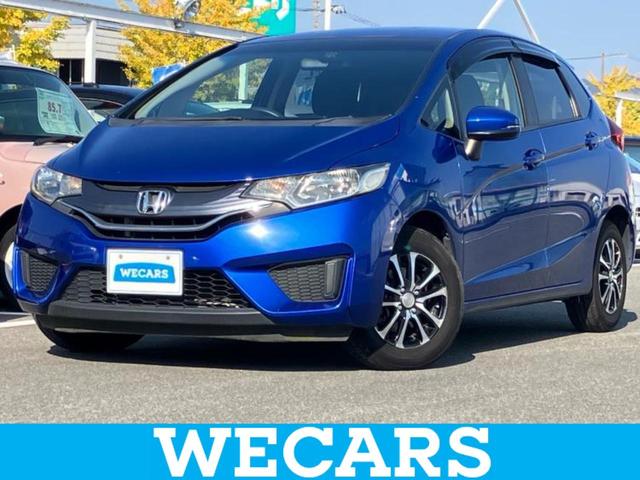 フィット(ホンダ) １３Ｇ・Ｆパッケージ　純正　ＳＤナビ／ＥＢＤ付ＡＢＳ／横滑り防止装置／アイドリングストップ／エアバッグ　運転席／エアバッグ　助手席／アルミホイール　Aftermarket　１４インチ／パワーウインドウ／キーレスエントリー　盗難防止装置 中古車画像