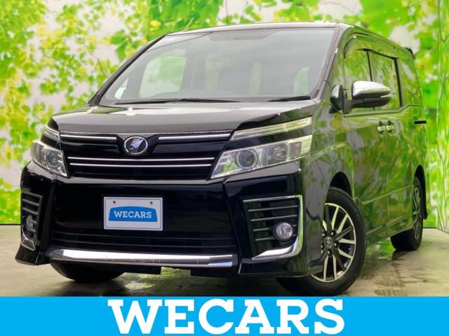 ヴォクシー ZSキラメキ 社外 8インチ SDナビ/フリップダウンモニター 社外 10.1インチ/両側電動スライドドア/ヘッドランプ LED/Bluetooth接続/ETC/EBD付ABS/横滑り防止装置 後席モニター(1枚目)