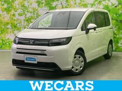 フリード eHEVエアー 保証書/純正 8インチ ナビ/ホンダセンシング/両側電動スライドドア/車線逸脱防止支援システム/登録済未使用車/ヘッドランプ LED/Bluetooth接続/EBD付ABS/横滑り防止装置 禁煙車 中古車画像