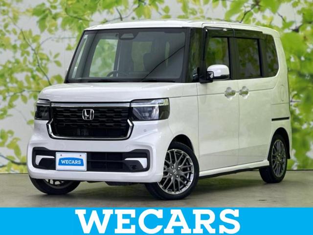Ｎ−ＢＯＸカスタム(ホンダ) ターボ　新品タイヤ／保証書／純正　８インチ　ナビ／ホンダセンシング／両側電動スライドドア／シートヒーター　前席／車線逸脱防止支援システム／シート　ハーフレザー／パーキングアシスト　バックガイド　ターボ　ＥＴＣ 中古車画像