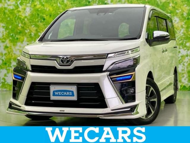 ヴォクシー(トヨタ) ＺＳキラメキ３　モデリスタエアロ／Aftermarket　１１インチ　ＳＤナビ／フリップダウンモニター　Aftermarket　１０．１インチ／トヨタセーフティセンス／両側電動スライドドア／車線逸脱防止支援システム／シート　ハーフレザー　フルエアロ 中古車画像