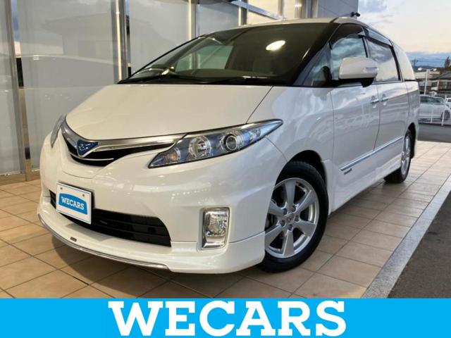 エスティマハイブリッド(トヨタ) ４ＷＤ　Ｘ　保証書／純正　ＳＤナビ／電動スライドドア／ヘッドランプ　ＨＩＤ／Ｂｌｕｅｔｏｏｔｈ接続／ＥＴＣ／ＥＢＤ付ＡＢＳ／横滑り防止装置／バックモニター／ワンセグＴＶ／エアバッグ　運転席／エアバッグ　助手席 中古車画像