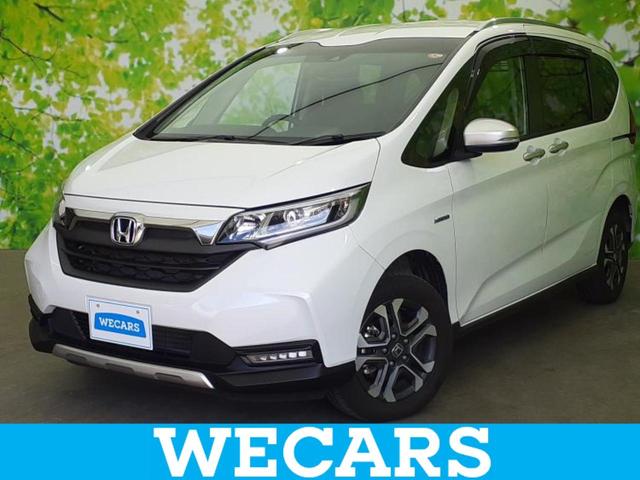 フリード＋（ホンダ）４ＷＤハイブリッドクロスターホンダセンシング　保証書／純正　９インチ　ＳＤナビ／衝突安全装置／両側電動スライドドア／シートヒーター／車線逸脱防止支援システム／シート　ハーフレザー／ヘッドランプ　ＬＥＤ／ＵＳＢジャック／Ｂｌｕｅｔｏｏｔｈ接続 中古車画像