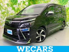 ヴォクシー ZSキラメキ2 新品タイヤ/モデリスタエアロ/保証書/純正 10インチ SDナビ/フリップダウンモニター 純正 12.1インチ/トヨタセーフティセンス/両側電動スライドドア/車線逸脱防止支援システム フルエアロ 中古車画像