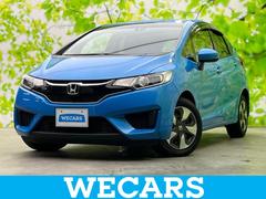 フィットハイブリッド ハイブリッド・Lパッケージ 新品タイヤ/純正 SDナビ/ヘッドランプ HID/Bluetooth接続/ETC/EBD付ABS/横滑り防止装置/アイドリングストップ/バックモニター/フルセグTV/エアバッグ 運転席 バックカメラ 中古車画像