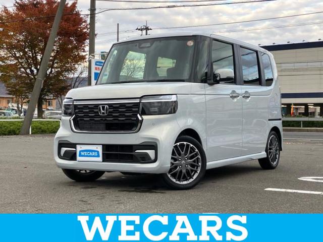 Ｎ−ＢＯＸカスタム(ホンダ) ターボ　新品タイヤ／保証書／純正　９インチ　ＳＤナビ／ホンダセンシング／両側電動スライドドア／シートヒーター　前席／全方位モニター／車線逸脱防止支援システム／シート　ハーフレザー　ターボ　衝突被害軽減システム 中古車画像