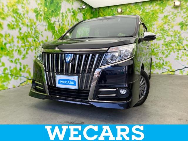 エスクァイア(トヨタ) ハイブリッドＧｉブラックテーラード　保証書／純正　１０インチ　ＳＤナビ／トヨタセーフティセンス／両側電動スライドドア／シートヒーター　前席／車線逸脱防止支援システム／シート　合皮／ヘッドランプ　ＬＥＤ／Ｂｌｕｅｔｏｏｔｈ接続／ＥＴＣ 中古車画像