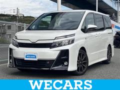 ヴォクシー ZS GRスポーツ 新品タイヤ/保証書/純正 9インチ SDナビ/衝突安全装置/両側電動スライドドア/車線逸脱防止支援システム/シート ハーフレザー/パーキングアシスト バックガイド/ヘッドランプ LED バックカメラ 中古車画像