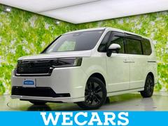 ステップワゴン 4WDスパーダ 新品タイヤ/純正 10インチ SDナビ/フリップダウンモニター/衝突安全装置/両側電動スライドドア/シートヒーター/車線逸脱防止支援システム/シート ハーフレザー/電動バックドア 衝突被害軽減システム 中古車画像