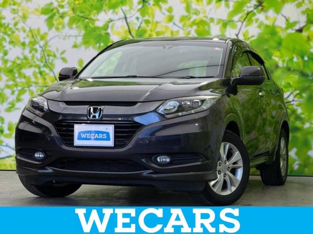 ヴェゼル(ホンダ) ハイブリッドＸ　新品タイヤ／保証書／Aftermarket　ＳＤナビ／衝突安全装置／ヘッドランプ　ＬＥＤ／ＥＴＣ／ＥＢＤ付ＡＢＳ／横滑り防止装置／アイドリングストップ／ホンダセンシング／地上波デジタルチューナー／エアバッグ　運転席 中古車画像