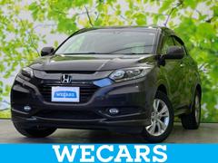 ヴェゼル ハイブリッドX 新品タイヤ/保証書/社外 SDナビ/衝突安全装置/ヘッドランプ LED/ETC/EBD付ABS/横滑り防止装置/アイドリングストップ/ホンダセンシング/地上波デジタルチューナー/エアバッグ 運転席 中古車画像