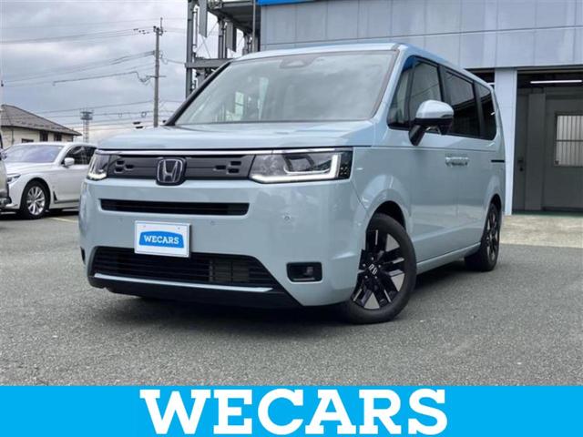 ステップワゴン(ホンダ) ｅＨＥＶエアー　保証書／純正　１１インチ　ＳＤナビ／フリップダウンモニター　純正　１５．６インチ／ホンダセンシング／両側電動スライドドア／車線逸脱防止支援システム／ドライブレコーダー　前後　衝突被害軽減システム 中古車画像