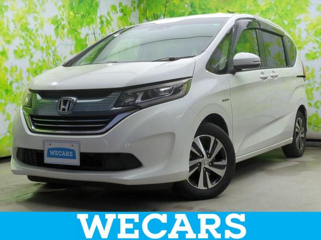 フリード＋ハイブリッド(ホンダ) ハイブリッドＥＸ　新品タイヤ／保証書／純正　９インチ　ナビ／ホンダセンシング／両側電動スライドドア／シートヒーター　前席／車線逸脱防止支援システム／ドライブレコーダー　純正／ヘッドランプ　ＬＥＤ　衝突被害軽減システム 中古車画像