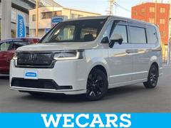 ステップワゴン eHEVスパーダ 新品タイヤ/保証書/純正 9インチ メモリーナビ/フリップダウンモニター 純正 10.1インチ/ホンダセンシング/両側電動スライドドア/シートヒーター/マルチビューカメラシステム 衝突被害軽減システム 中古車画像