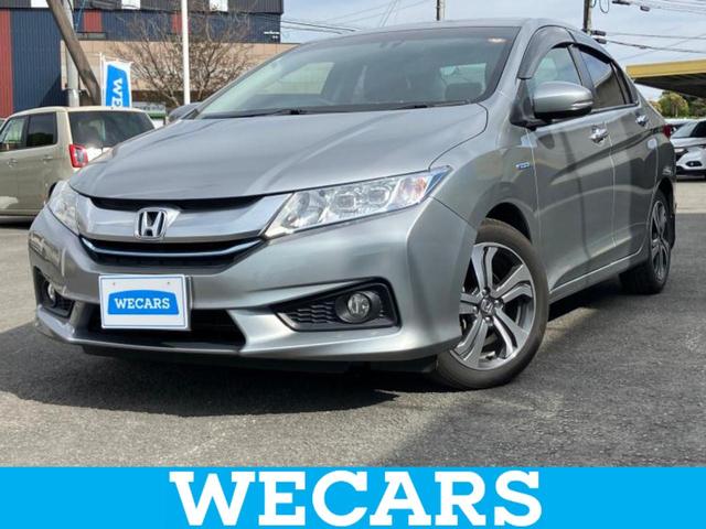 グレイス(ホンダ) ハイブリッドＥＸ　新品タイヤ／保証書／純正　ＳＤナビ／シティーブレーキアクティブシステム（ホンダ）／シートヒーター　前席／シート　合皮／ドライブレコーダー　Aftermarket／ヘッドランプ　ＬＥＤ／ＵＳＢジャック　バックカメラ 中古車画像